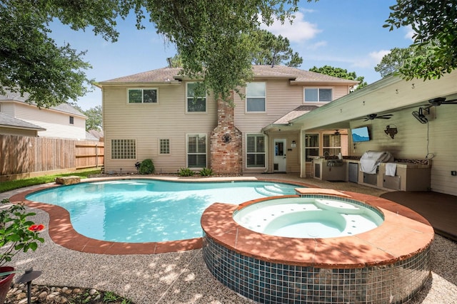 17603 Hidden Forest Dr, Spring, TX 77379 - view of pool featuring area for grilling, ceiling fan, a pool with connected hot tub, and a patio area