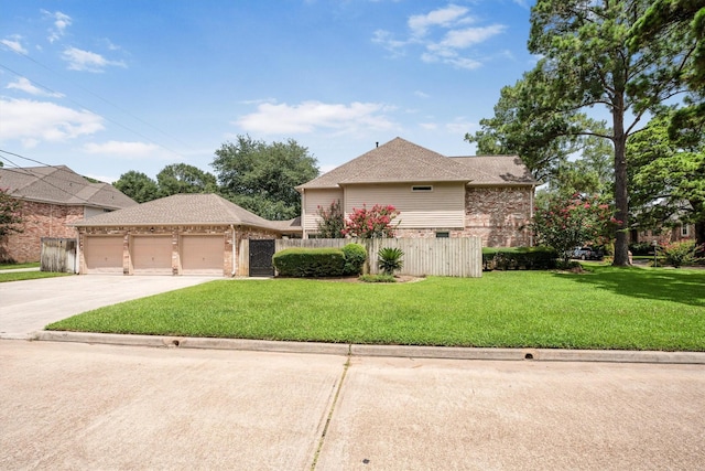 17603 Hidden Forest Dr, Spring, TX 77379 - view of front of home with brick siding, concrete driveway, a garage, and roof with shingles