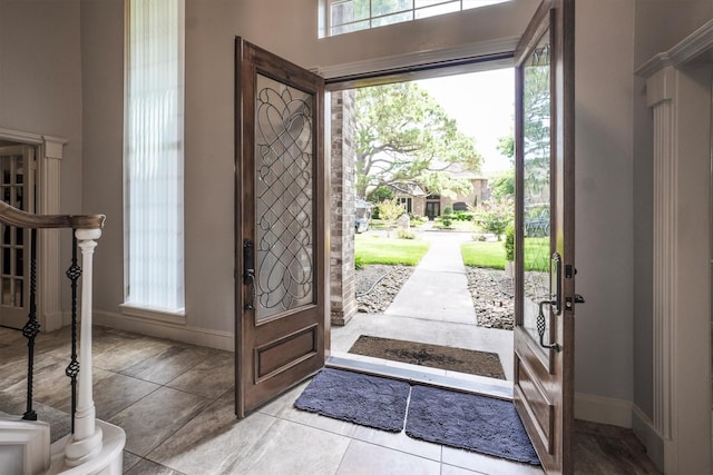 17603 Hidden Forest Dr, Spring, TX 77379 - entrance foyer with baseboards and tile patterned flooring