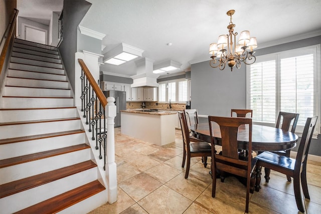 17603 Hidden Forest Dr, Spring, TX 77379 - dining area with ornamental molding, stairway, a chandelier, and light tile patterned flooring
