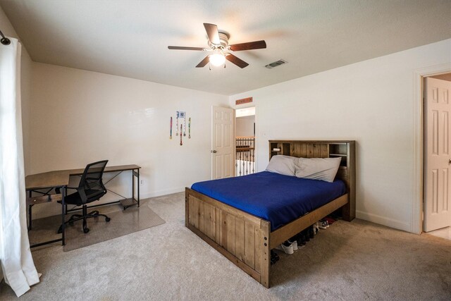 17603 Hidden Forest Dr, Spring, TX 77379 - carpeted bedroom featuring a ceiling fan and an office area