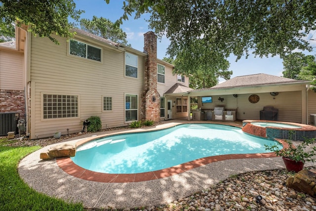 17603 Hidden Forest Dr, Spring, TX 77379 - view of pool with a patio area and a pool with connected hot tub