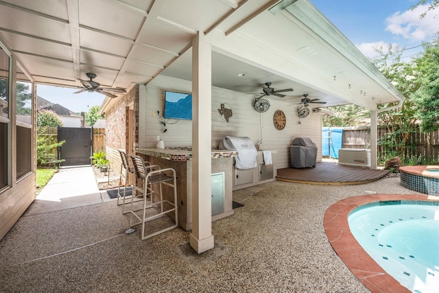 17603 Hidden Forest Dr, Spring, TX 77379 - fenced backyard featuring a ceiling fan, grilling area, and a wooden deck