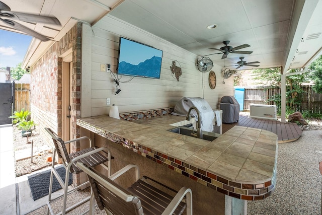 17603 Hidden Forest Dr, Spring, TX 77379 - view of patio / terrace with ceiling fan and a deck