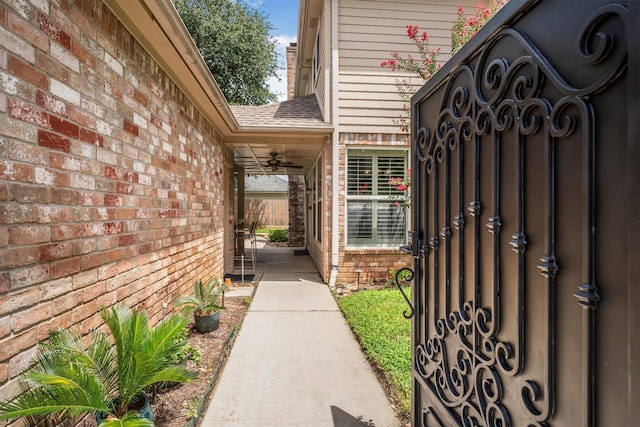 17603 Hidden Forest Dr, Spring, TX 77379 - entrance to property with brick siding, a ceiling fan, and a shingled roof