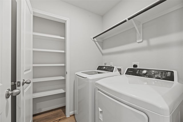 5263 Shallowhurst Ln, Katy, TX 77449 - laundry room featuring separate washer and dryer and light wood finished floors