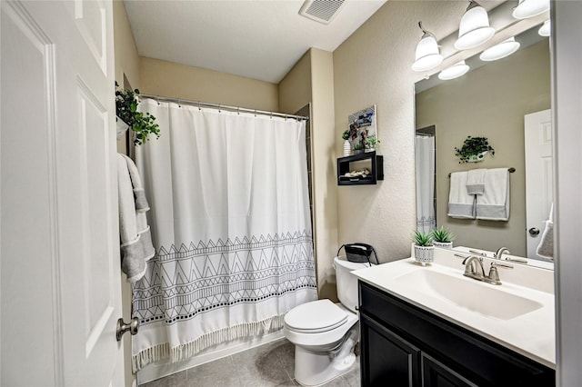 3854 Fleetwood Falls Ln, Spring, TX 77386 - full bathroom featuring vanity, tile patterned flooring, a textured wall, and a shower with shower curtain
