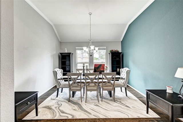3854 Fleetwood Falls Ln, Spring, TX 77386 - dining space with dark wood-style flooring, a chandelier, vaulted ceiling, and ornamental molding
