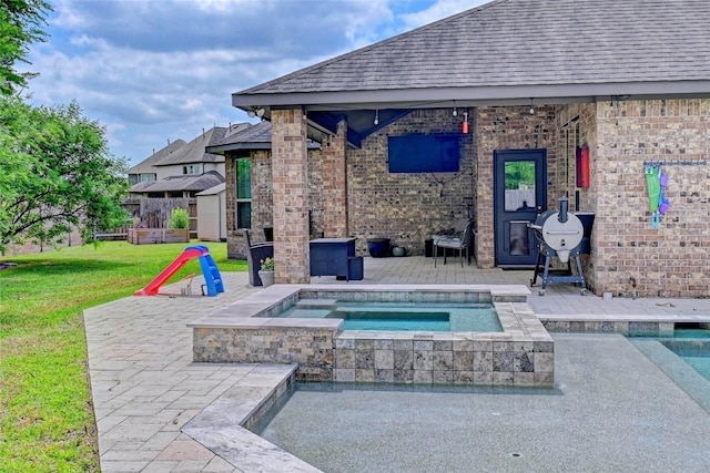 3854 Fleetwood Falls Ln, Spring, TX 77386 - swimming pool with a yard, a patio, and an in-ground hot tub