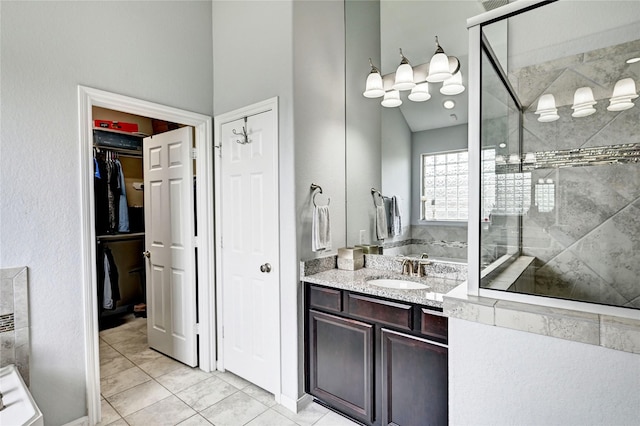 3854 Fleetwood Falls Ln, Spring, TX 77386 - full bathroom with a shower stall, a walk in closet, and vanity