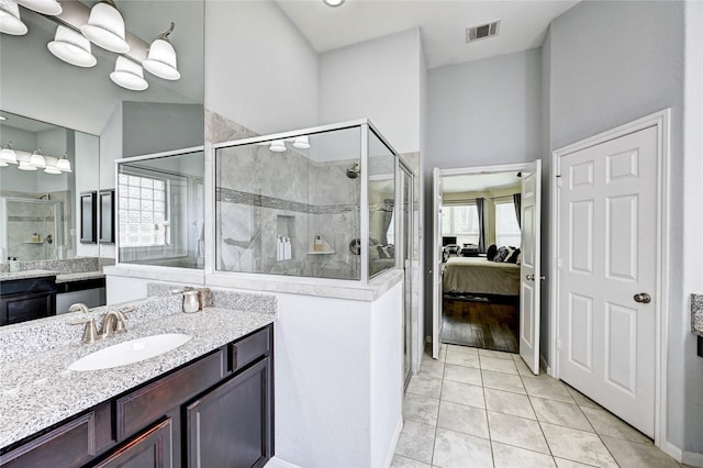 3854 Fleetwood Falls Ln, Spring, TX 77386 - bathroom featuring ensuite bathroom, a shower stall, vanity, and tile patterned flooring