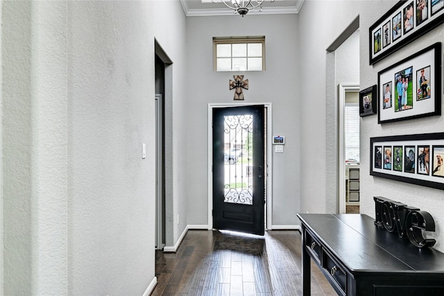 3854 Fleetwood Falls Ln, Spring, TX 77386 - foyer entrance with dark wood-type flooring, crown molding, and a textured wall