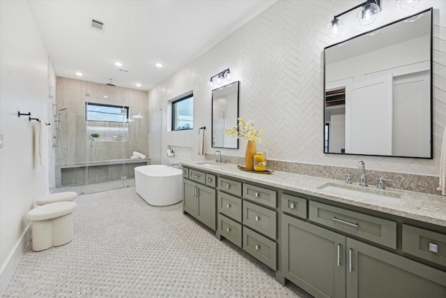 431 W 30th St, Houston, TX 77018 - full bath featuring tiled shower, double vanity, a freestanding tub, and tile walls
