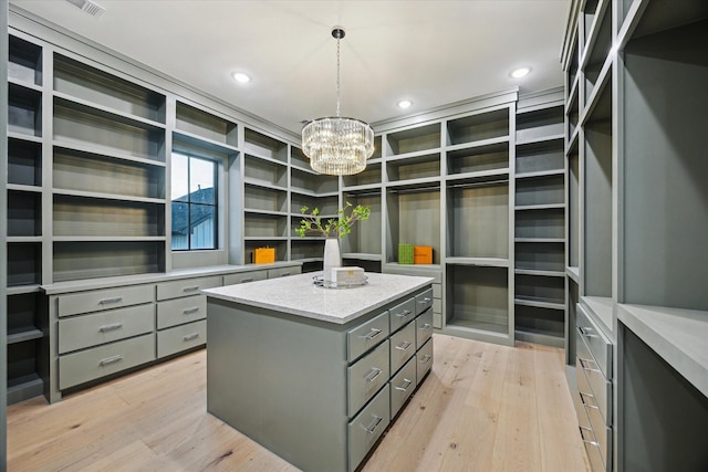 431 W 30th St, Houston, TX 77018 - spacious closet with a chandelier and light wood-type flooring