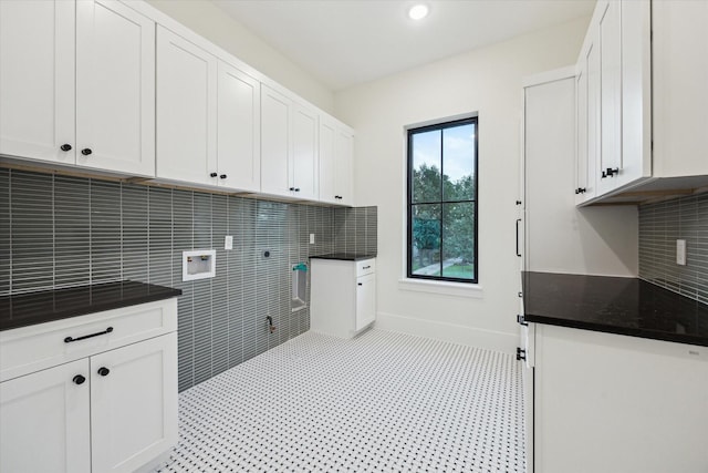 431 W 30th St, Houston, TX 77018 - washroom with cabinet space, hookup for a washing machine, and hookup for an electric dryer