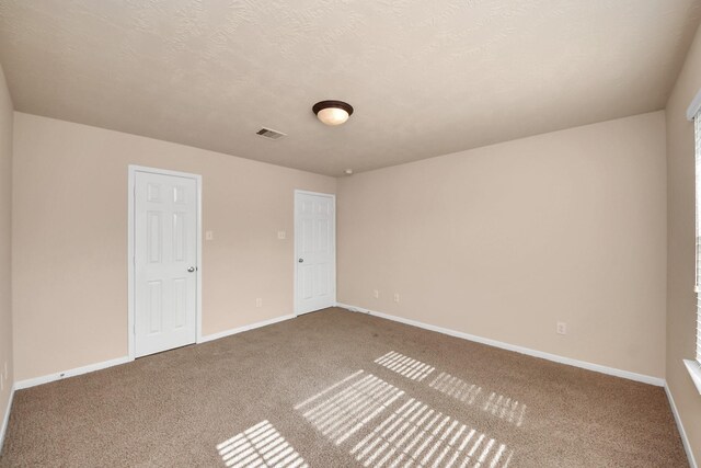 14311 Lakepointe Bend Ln, Cypress, TX 77429 - unfurnished bedroom featuring carpet flooring