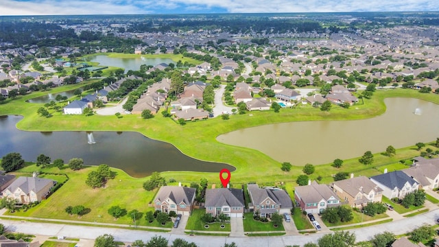 14311 Lakepointe Bend Ln, Cypress, TX 77429 - aerial view of residential area featuring a large body of water and a golf course