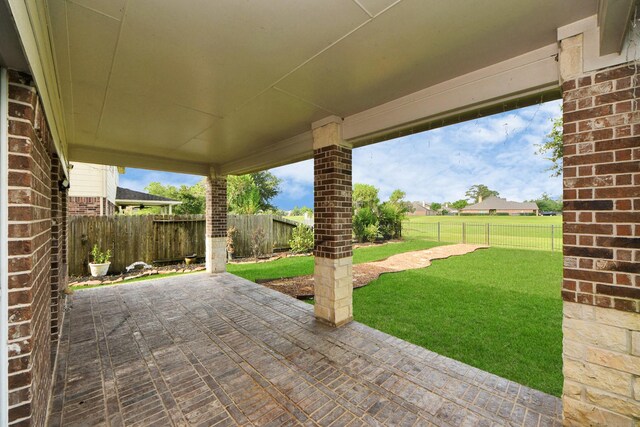 14311 Lakepointe Bend Ln, Cypress, TX 77429 - fenced backyard featuring a patio