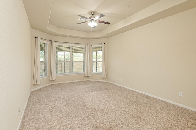 19022 Summer Farm Trl, Richmond, TX 77407 - carpeted empty room featuring ceiling fan and a raised ceiling
