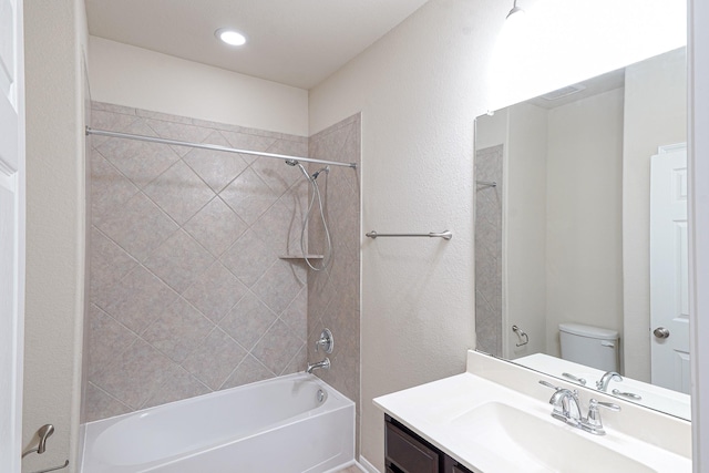 19022 Summer Farm Trl, Richmond, TX 77407 - bathroom with shower / washtub combination, vanity, and a textured wall