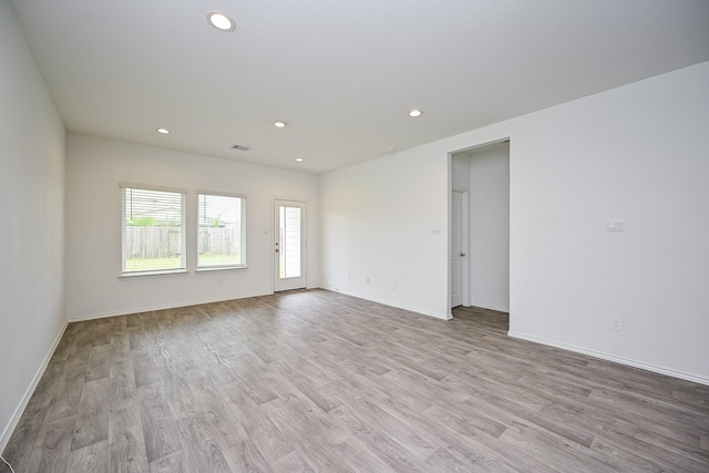 5411 Auburn Gardens Ct, Spring, TX 77373 - spare room with wood finished floors and recessed lighting