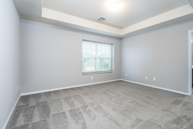 20027 Bayliss Manor Ln, Cypress, TX 77433 - empty room featuring carpet and a raised ceiling