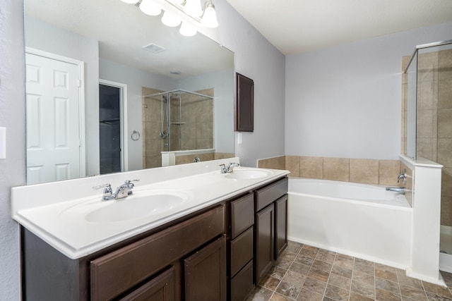 20027 Bayliss Manor Ln, Cypress, TX 77433 - full bathroom with a garden tub, double vanity, and a stall shower