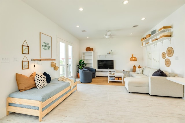 2401 103rd St, Galveston, TX 77554 - living area featuring a ceiling fan, recessed lighting, and light wood-style floors