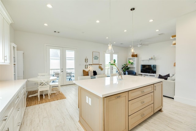 2401 103rd St, Galveston, TX 77554 - kitchen with french doors, open floor plan, recessed lighting, light countertops, and a ceiling fan