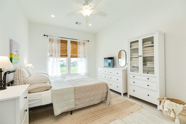 2401 103rd St, Galveston, TX 77554 - bedroom with recessed lighting, ceiling fan, and light wood-style floors