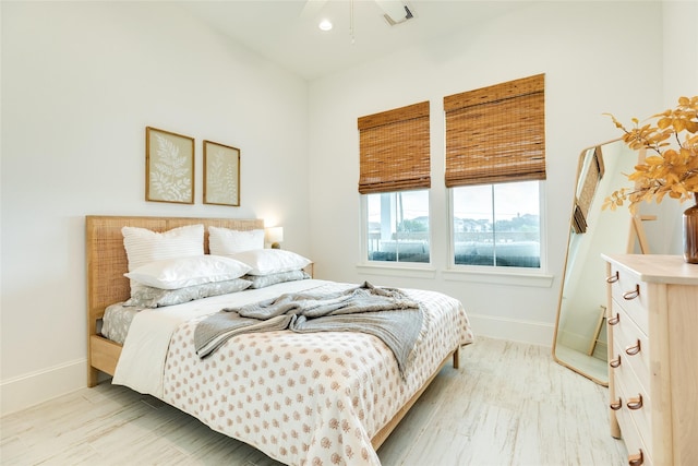 2401 103rd St, Galveston, TX 77554 - bedroom featuring light wood finished floors and recessed lighting