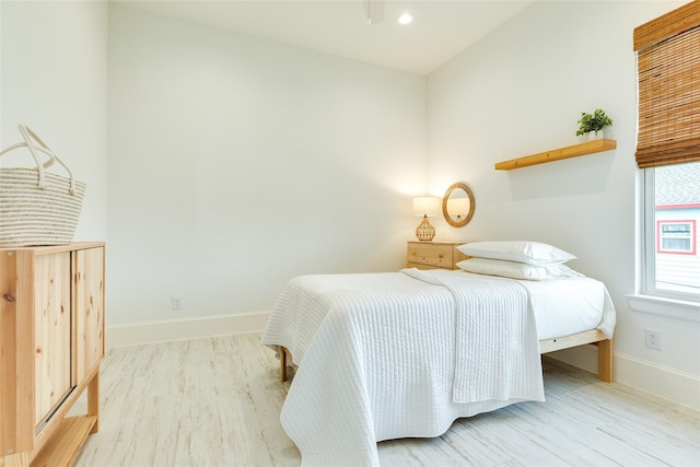 2401 103rd St, Galveston, TX 77554 - bedroom with wood finished floors and recessed lighting
