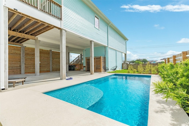 2401 103rd St, Galveston, TX 77554 - view of pool with stairway and a patio