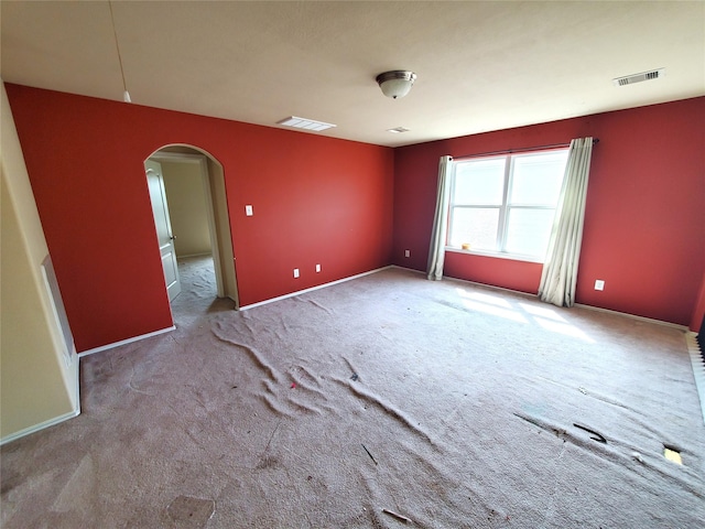 2714 Glenfield Manor Ln, Houston, TX 77014 - carpeted spare room with arched walkways and baseboards