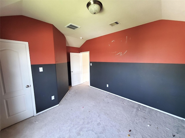 2714 Glenfield Manor Ln, Houston, TX 77014 - unfurnished bedroom featuring vaulted ceiling and light carpet