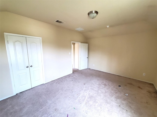 2714 Glenfield Manor Ln, Houston, TX 77014 - unfurnished bedroom featuring lofted ceiling, carpet, and a closet