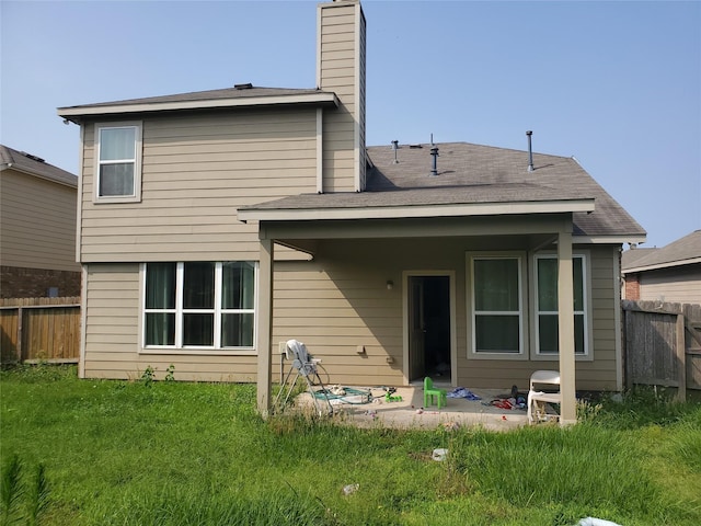 2714 Glenfield Manor Ln, Houston, TX 77014 - rear view of house with a chimney