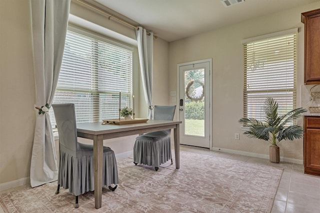 135 Forest Heights Way, Montgomery, TX 77316 - dining room with light tile patterned flooring and a desk
