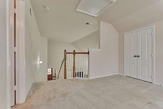 135 Forest Heights Way, Montgomery, TX 77316 - bonus room featuring lofted ceiling, carpet flooring, and attic access