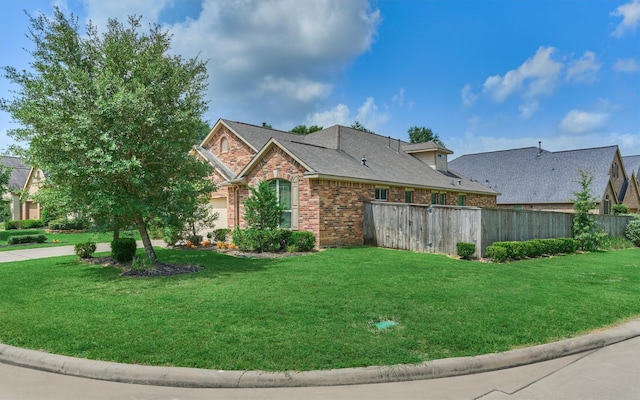 135 Forest Heights Way, Montgomery, TX 77316 - view of home's exterior featuring brick siding, a garage, and a shingled roof