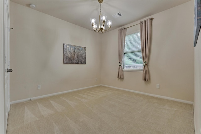 135 Forest Heights Way, Montgomery, TX 77316 - empty room featuring a chandelier, light colored carpet, and a smoke detector