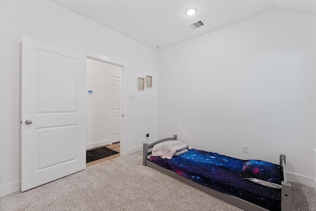 21635 Alberta Forest Cir, Magnolia, TX 77355 - unfurnished bedroom featuring carpet floors and vaulted ceiling