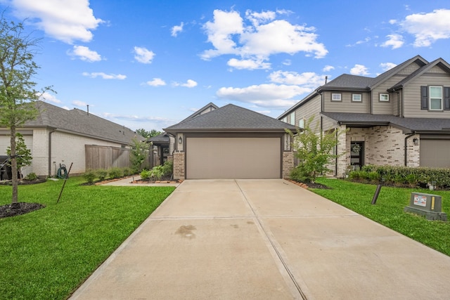 21635 Alberta Forest Cir, Magnolia, TX 77355 - view of front of home featuring brick siding, concrete driveway, and an attached garage