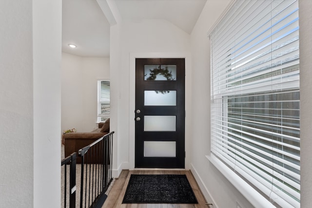 21635 Alberta Forest Cir, Magnolia, TX 77355 - foyer featuring wood finished floors and lofted ceiling