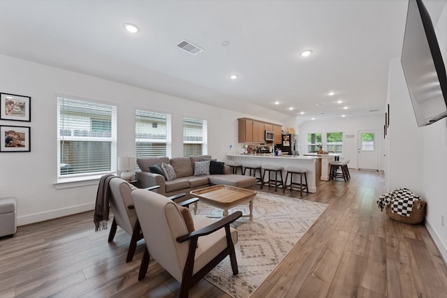 21635 Alberta Forest Cir, Magnolia, TX 77355 - living area featuring light wood-style floors and recessed lighting