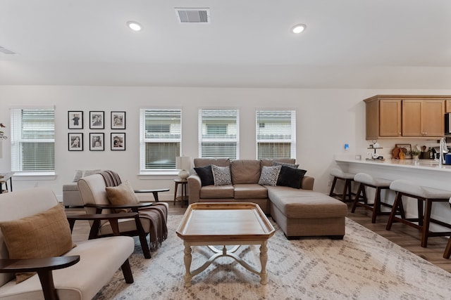 21635 Alberta Forest Cir, Magnolia, TX 77355 - living room featuring light wood finished floors and recessed lighting