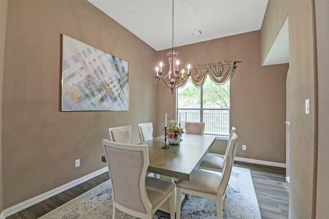 18415 Pin Oak Bend Dr, Cypress, TX 77433 - dining room with wood finished floors and a chandelier