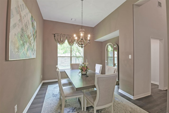 18415 Pin Oak Bend Dr, Cypress, TX 77433 - dining area featuring dark wood finished floors and a chandelier