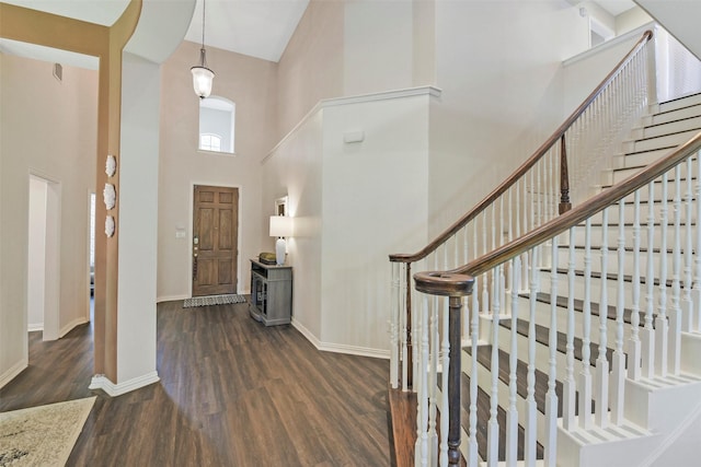 18415 Pin Oak Bend Dr, Cypress, TX 77433 - foyer with a towering ceiling, dark wood-style floors, and stairway