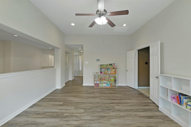 18415 Pin Oak Bend Dr, Cypress, TX 77433 - empty room featuring attic access, a ceiling fan, wood finished floors, and recessed lighting